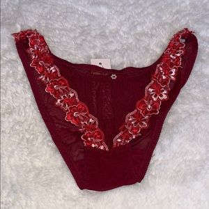 Red bikini panty with red and pink lace